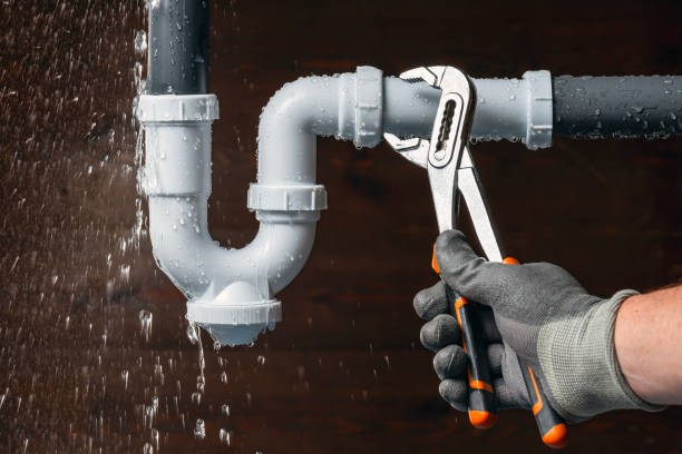 Professional Drain Cleaning technician working in Milton, MA